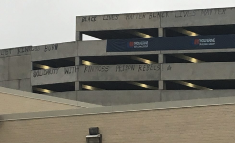 Graffitti reading "Black Lives Matter". "Let Kinross Burn" and "Solidarity with Kinross Rebels"